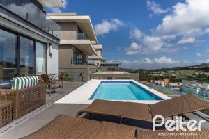 Casa em Condomínio à venda com 303m², 3 dormitórios, 3 suítes, 4 vagas, no bairro Alphaville em PORTO ALEGRE