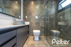 Casa em Condomínio à venda com 303m², 3 dormitórios, 3 suítes, 4 vagas, no bairro Alphaville em PORTO ALEGRE