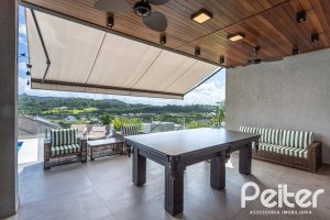 Casa em Condomínio à venda com 303m², 3 dormitórios, 3 suítes, 4 vagas, no bairro Alphaville em PORTO ALEGRE