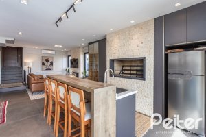 Casa em Condomínio à venda com 303m², 3 dormitórios, 3 suítes, 4 vagas, no bairro Alphaville em PORTO ALEGRE