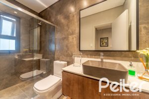 Casa em Condomínio à venda com 303m², 3 dormitórios, 3 suítes, 4 vagas, no bairro Alphaville em PORTO ALEGRE