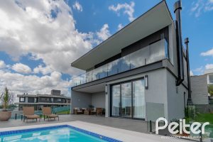 Casa em Condomínio à venda com 303m², 3 dormitórios, 3 suítes, 4 vagas, no bairro Alphaville em PORTO ALEGRE