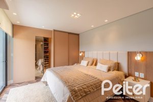 Casa em Condomínio à venda com 303m², 3 dormitórios, 3 suítes, 4 vagas, no bairro Alphaville em PORTO ALEGRE