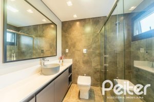 Casa em Condomínio à venda com 303m², 3 dormitórios, 3 suítes, 4 vagas, no bairro Alphaville em PORTO ALEGRE