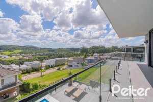 Casa em Condomínio à venda com 303m², 3 dormitórios, 3 suítes, 4 vagas, no bairro Alphaville em PORTO ALEGRE