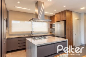 Casa em Condomínio à venda com 303m², 3 dormitórios, 3 suítes, 4 vagas, no bairro Alphaville em PORTO ALEGRE