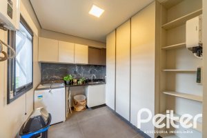 Casa em Condomínio à venda com 303m², 3 dormitórios, 3 suítes, 4 vagas, no bairro Alphaville em PORTO ALEGRE