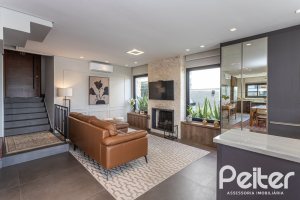 Casa em Condomínio à venda com 303m², 3 dormitórios, 3 suítes, 4 vagas, no bairro Alphaville em PORTO ALEGRE