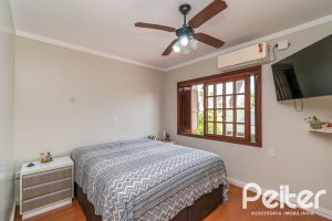 Casa à venda com 279m², 4 dormitórios, 1 suíte, 4 vagas, no bairro Jardim Isabel em Porto Alegre