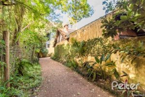 Casa em Condomínio à venda com 257m², 3 dormitórios, 1 suíte, 3 vagas, no bairro Tristeza em PORTO ALEGRE