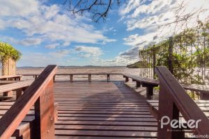 Casa em Condomínio à venda com 257m², 3 dormitórios, 1 suíte, 3 vagas, no bairro Tristeza em PORTO ALEGRE