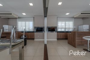 Apartamento à venda com 57m², 2 dormitórios, 1 suíte, 1 vaga, no bairro Vila Nova em PORTO ALEGRE