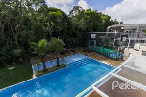 Casa em Condomínio à venda com 162m², 4 dormitórios, 2 suítes, 2 vagas, no bairro Vila Nova em PORTO ALEGRE