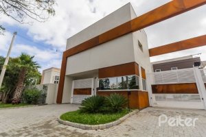 Casa em Condomínio à venda com 162m², 4 dormitórios, 2 suítes, 2 vagas, no bairro Vila Nova em PORTO ALEGRE