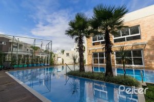 Casa em Condomínio à venda com 162m², 4 dormitórios, 2 suítes, 2 vagas, no bairro Vila Nova em PORTO ALEGRE