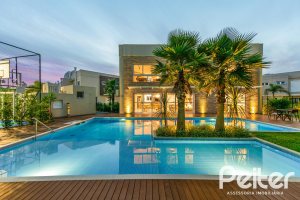 Casa em Condomínio à venda com 162m², 4 dormitórios, 2 suítes, 2 vagas, no bairro Vila Nova em PORTO ALEGRE