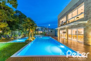 Casa em Condomínio à venda com 162m², 4 dormitórios, 2 suítes, 2 vagas, no bairro Vila Nova em PORTO ALEGRE