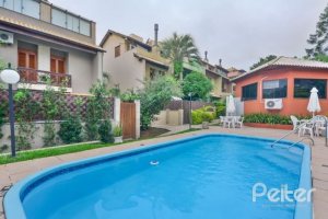 Casa em Condomínio à venda com 181m², 3 dormitórios, 1 suíte, 3 vagas, no bairro Tristeza em PORTO ALEGRE