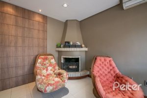 Casa em Condomínio à venda com 240m², 3 dormitórios, 1 suíte, 2 vagas, no bairro Jardim Isabel em Porto Alegre