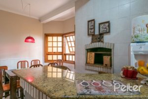 Casa em Condomínio à venda com 240m², 3 dormitórios, 1 suíte, 2 vagas, no bairro Jardim Isabel em Porto Alegre