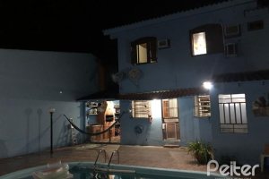Casa à venda com 159m², 3 dormitórios, 1 suíte, 3 vagas, no bairro Ipanema / Altos Do Ipê em Porto Alegre
