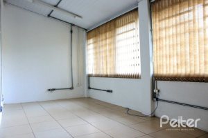 Casa à venda com 290m², 3 dormitórios, 6 vagas, no bairro Menino Deus em Porto Alegre