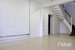 Casa à venda com 290m², 3 dormitórios, 6 vagas, no bairro Menino Deus em Porto Alegre