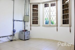 Casa à venda com 290m², 3 dormitórios, 6 vagas, no bairro Menino Deus em Porto Alegre