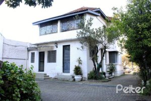 Casa à venda com 290m², 3 dormitórios, 6 vagas, no bairro Menino Deus em Porto Alegre