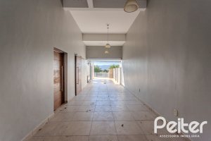 Casa à venda com 298m², 4 dormitórios, 1 suíte, 4 vagas, no bairro Ipanema / Imperial Parque em Porto Alegre