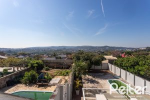 Casa à venda com 298m², 4 dormitórios, 1 suíte, 4 vagas, no bairro Ipanema / Imperial Parque em Porto Alegre