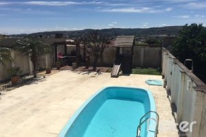 Casa à venda com 298m², 4 dormitórios, 1 suíte, 4 vagas, no bairro Ipanema / Imperial Parque em Porto Alegre