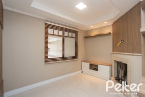 Casa em Condomínio à venda com 290m², 3 dormitórios, 1 suíte, 2 vagas, no bairro Jardim Isabel em Porto Alegre