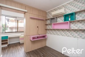 Casa em Condomínio à venda com 290m², 3 dormitórios, 1 suíte, 2 vagas, no bairro Jardim Isabel em Porto Alegre