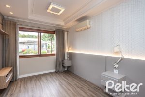 Casa em Condomínio à venda com 290m², 3 dormitórios, 1 suíte, 2 vagas, no bairro Jardim Isabel em Porto Alegre