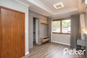 Casa em Condomínio à venda com 290m², 3 dormitórios, 1 suíte, 2 vagas, no bairro Jardim Isabel em Porto Alegre