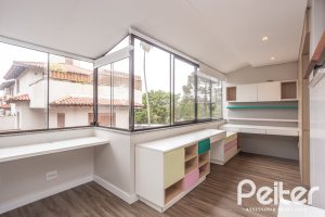 Casa em Condomínio à venda com 290m², 3 dormitórios, 1 suíte, 2 vagas, no bairro Jardim Isabel em Porto Alegre