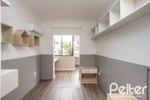 Casa em Condomínio à venda com 290m², 3 dormitórios, 1 suíte, 2 vagas, no bairro Jardim Isabel em Porto Alegre
