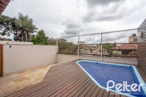 Casa em Condomínio à venda com 290m², 3 dormitórios, 1 suíte, 2 vagas, no bairro Jardim Isabel em Porto Alegre