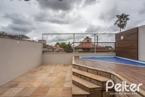 Casa em Condomínio à venda com 290m², 3 dormitórios, 1 suíte, 2 vagas, no bairro Jardim Isabel em Porto Alegre