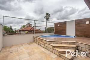 Casa em Condomínio à venda com 290m², 3 dormitórios, 1 suíte, 2 vagas, no bairro Jardim Isabel em Porto Alegre