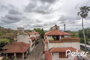 Casa em Condomínio à venda com 290m², 3 dormitórios, 1 suíte, 2 vagas, no bairro Jardim Isabel em Porto Alegre
