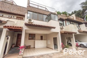 Casa em Condomínio à venda com 290m², 3 dormitórios, 1 suíte, 2 vagas, no bairro Jardim Isabel em Porto Alegre