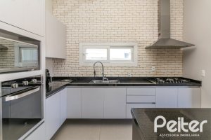 Casa em Condomínio à venda com 240m², 3 dormitórios, 3 suítes, 2 vagas, no bairro Alphaville em PORTO ALEGRE