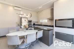 Casa em Condomínio à venda com 240m², 3 dormitórios, 3 suítes, 2 vagas, no bairro Alphaville em PORTO ALEGRE