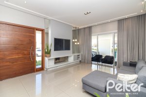 Casa em Condomínio à venda com 240m², 3 dormitórios, 3 suítes, 2 vagas, no bairro Alphaville em PORTO ALEGRE