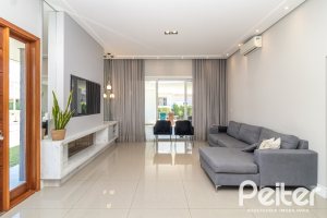 Casa em Condomínio à venda com 240m², 3 dormitórios, 3 suítes, 2 vagas, no bairro Alphaville em PORTO ALEGRE