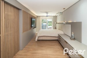 Casa em Condomínio à venda com 240m², 3 dormitórios, 3 suítes, 2 vagas, no bairro Alphaville em PORTO ALEGRE