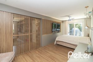 Casa em Condomínio à venda com 240m², 3 dormitórios, 3 suítes, 2 vagas, no bairro Alphaville em PORTO ALEGRE