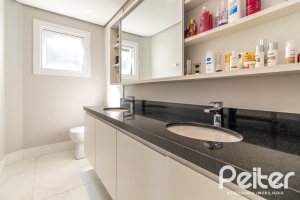 Casa em Condomínio à venda com 240m², 3 dormitórios, 3 suítes, 2 vagas, no bairro Alphaville em PORTO ALEGRE